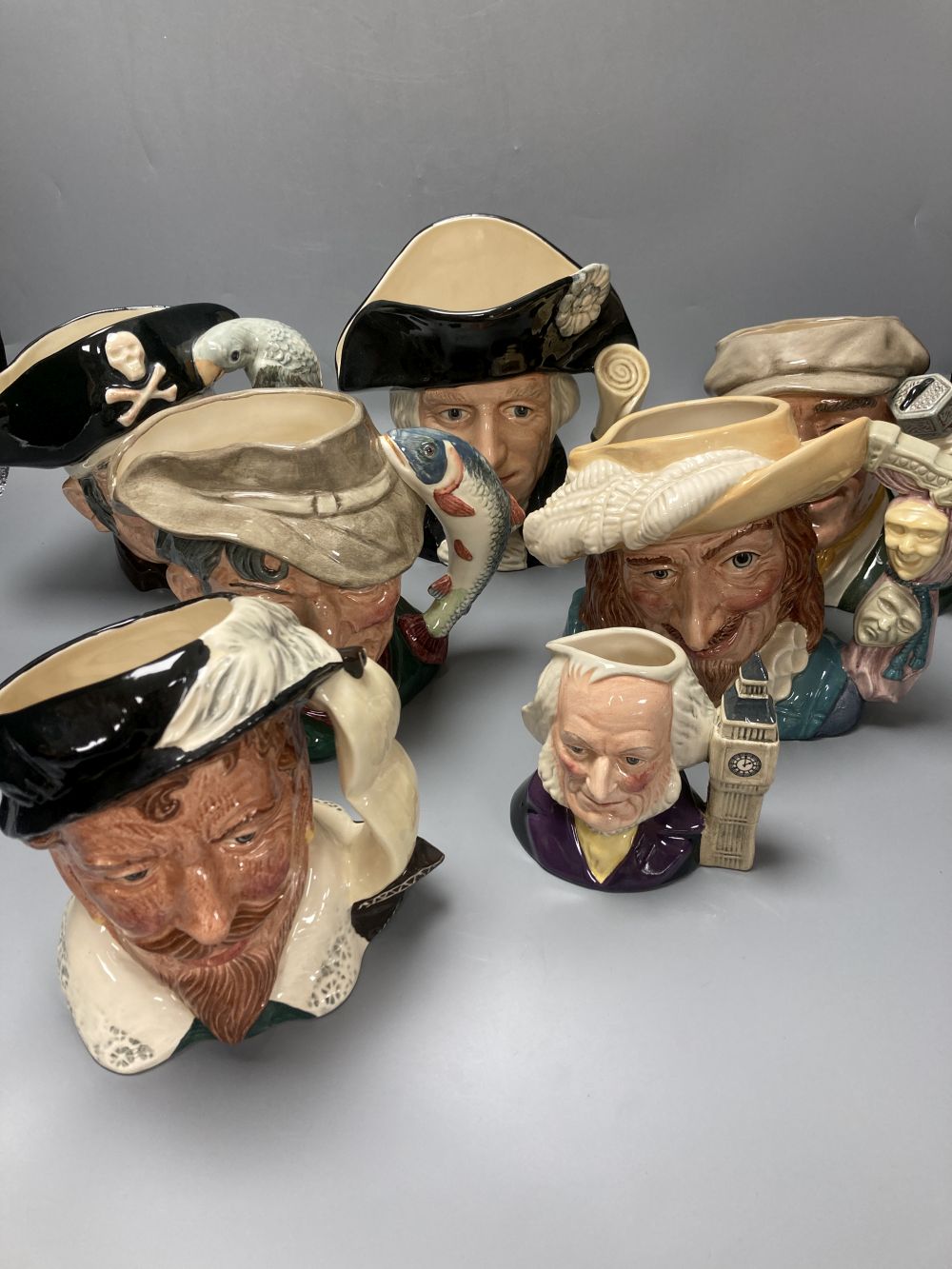 Six Royal Doulton character jugs and one smaller, tallest 18cm